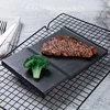 High quality home/hotel/restaurant cheap stocked matte black glazed ceramic rectangle sushi plate 9"