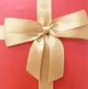 solid poly ribbon with 3 inches tied satin pre-tied ribbon bows with a gold twist to wrap