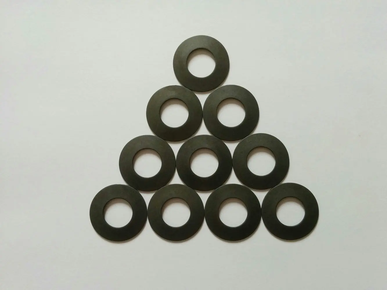 Metric Steel Belleville Spring Washer, 1.575"(40.0mm) Outer Diameter, 0.563"(14.3mm) Inner Diameter, .059"(1.5mm) Thickness, 2,550 Newtons Max. Load (Pack of 10)