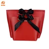 Wholesale Custom Printed Rope Handles Luxury Retail Gift Shopping Low Cost Paper Bag With Bow Tie Ribbon