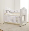 New Zealand Pine Wood Deluxe Baby Cot Attached To Bed Baby Cot China Importers
