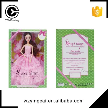 barbie doll with paper
