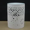Wholesale porcelain new hollow design tealight candle holder oil burner factory direct supply