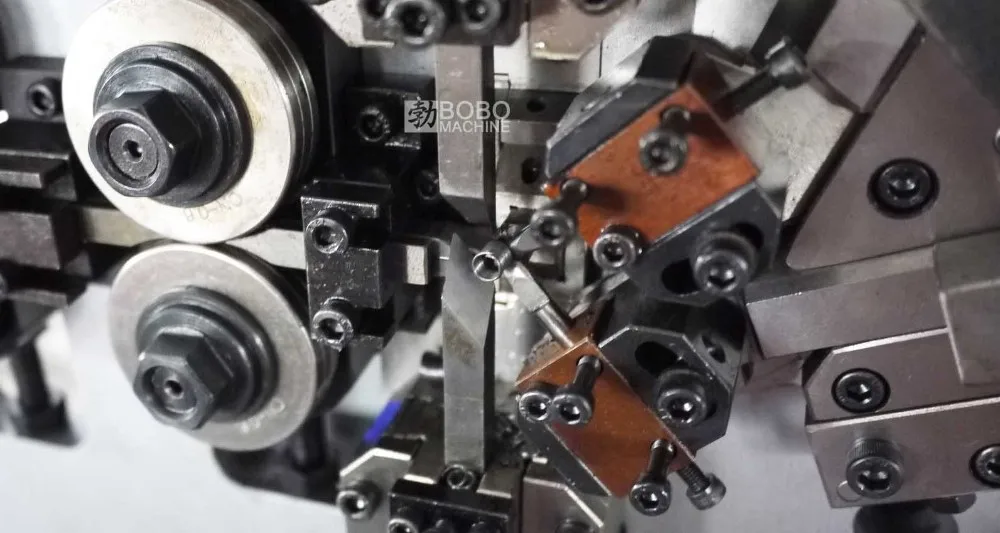 Automatic CNC Wire Coil Rolling Shutter Spring Making detail photo BOBO Machine automatic cnc wire coil rolling shutter spring making shown in a detail photo for this news article