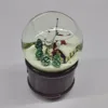 2017 most popular Resin Christmas Custom Snow Globe Water Globe With Wood Base Musical Water Globe