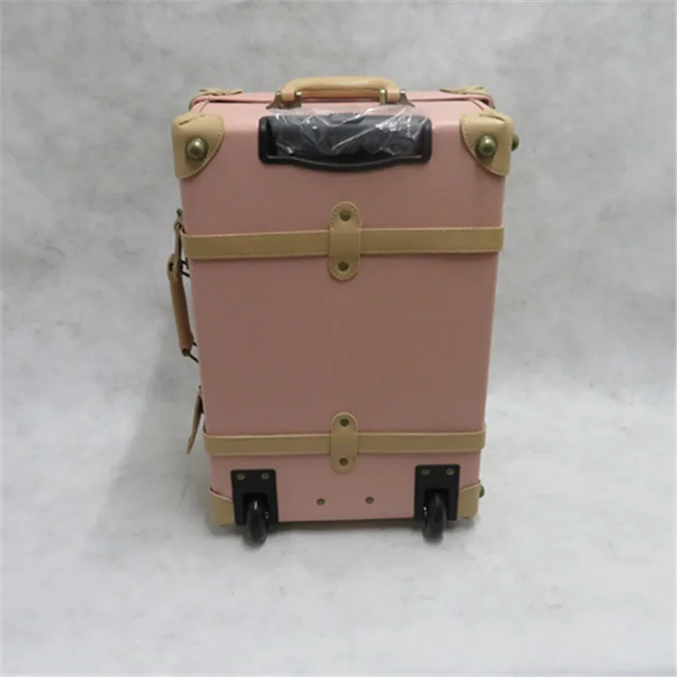 pink trunk suitcase