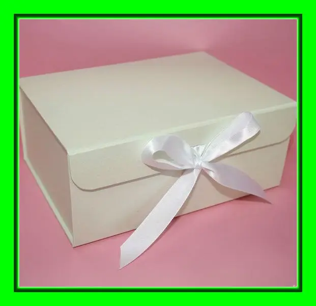 white paper box with ribbon