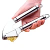 /product-detail/wb-tg304-gp02-oem-kitchen-tool-stainless-steel-304-high-capacity-garlic-press-with-drawing-polishing-process-60674096687.html
