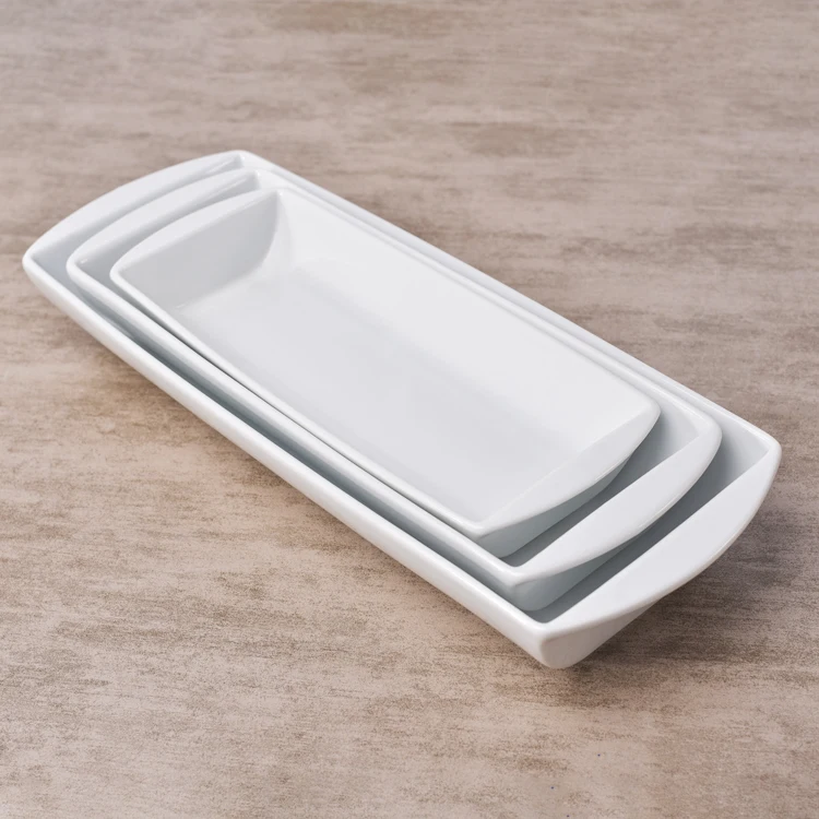 Ordinary fruit salad serving long deep white dinner food restaurant ceramic plates dishes .jpg