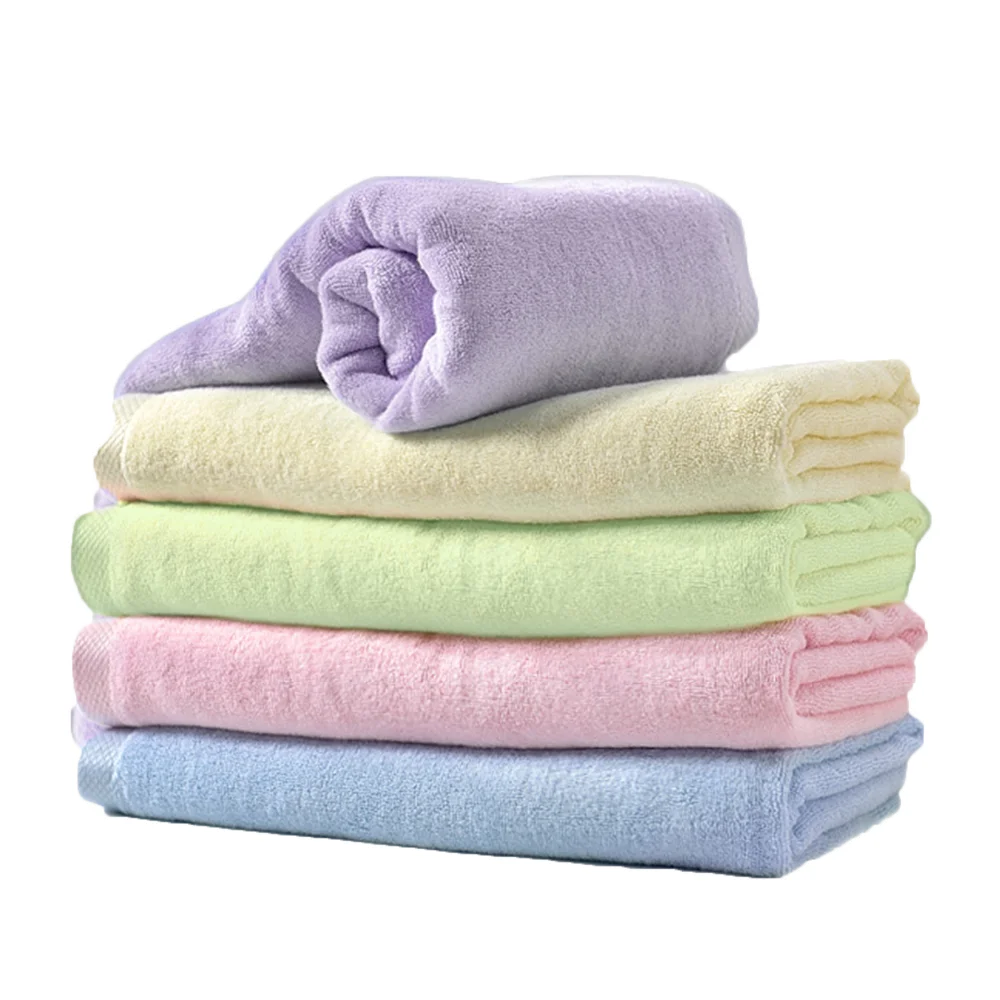 Приснилось полотенце. Полотенце махровое. Стопка полотенец. Сложенные полотенца. Цветные полотенца.