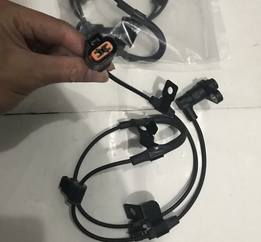 مصنع مباشرة سعر 4670a597 4670-a597 4670 a597 ABS الاستشعار السيارات ABS عجلة سرعة مستشعر لسيارات Mitsubishi