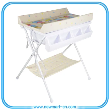 changing table and bathtub