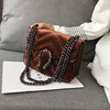 The new autumn/winter velvet small square bag versatile one-shoulder cross-body bag with snake-head chain