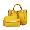 AR29 ladies beautiful tassel decoration handbags with factory price from guangzhou baiyun leather market pu handbag set