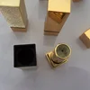 Free samples empty 5g black line square gold plastic lipstick case with UV spray coating