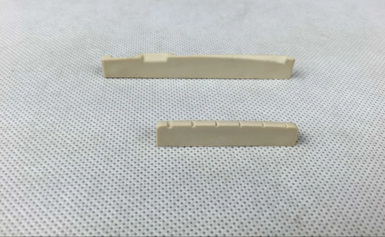 acoustic guitar saddlesd.png