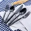 Custom hand forged matte black silverware for restaurant