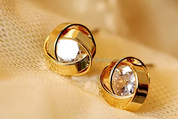 design of gold earrings & ear tops