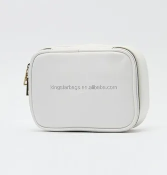 white cosmetic bag