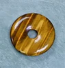 top quality good polished hollow round shape tiger eye for pendant