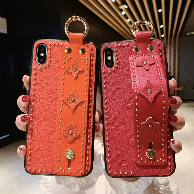 Download Super Luxury Fashion Lady Style Wrist Holder Genuine Leather Back Rivet Phone Case For Iphone 11 ...