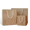 /product-detail/custom-printing-fashion-brown-drawstring-kraft-paper-cardboard-packaging-shopping-tote-bag-with-rope-handle-62188893967.html