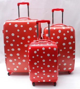 red polka dot suitcase