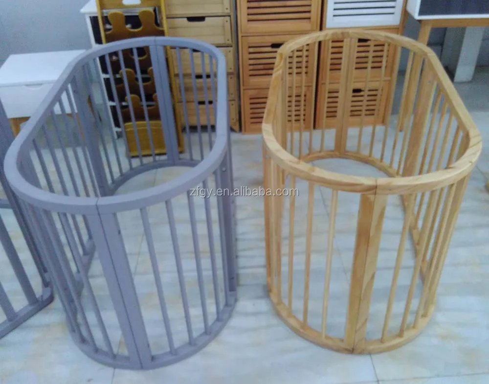 oval wooden playpen.jpg