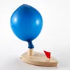 A wooden boat balloon blow boat Balloon powered ship water bath toy Simple boat Physics knowledge toys