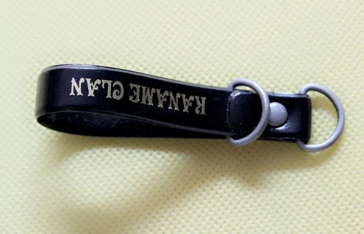 Black plastic mobile phone strap with rivet,pvc phone string