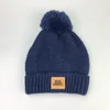 Wholesale solid custom own logo beanie winter hats for men skull cap beanie