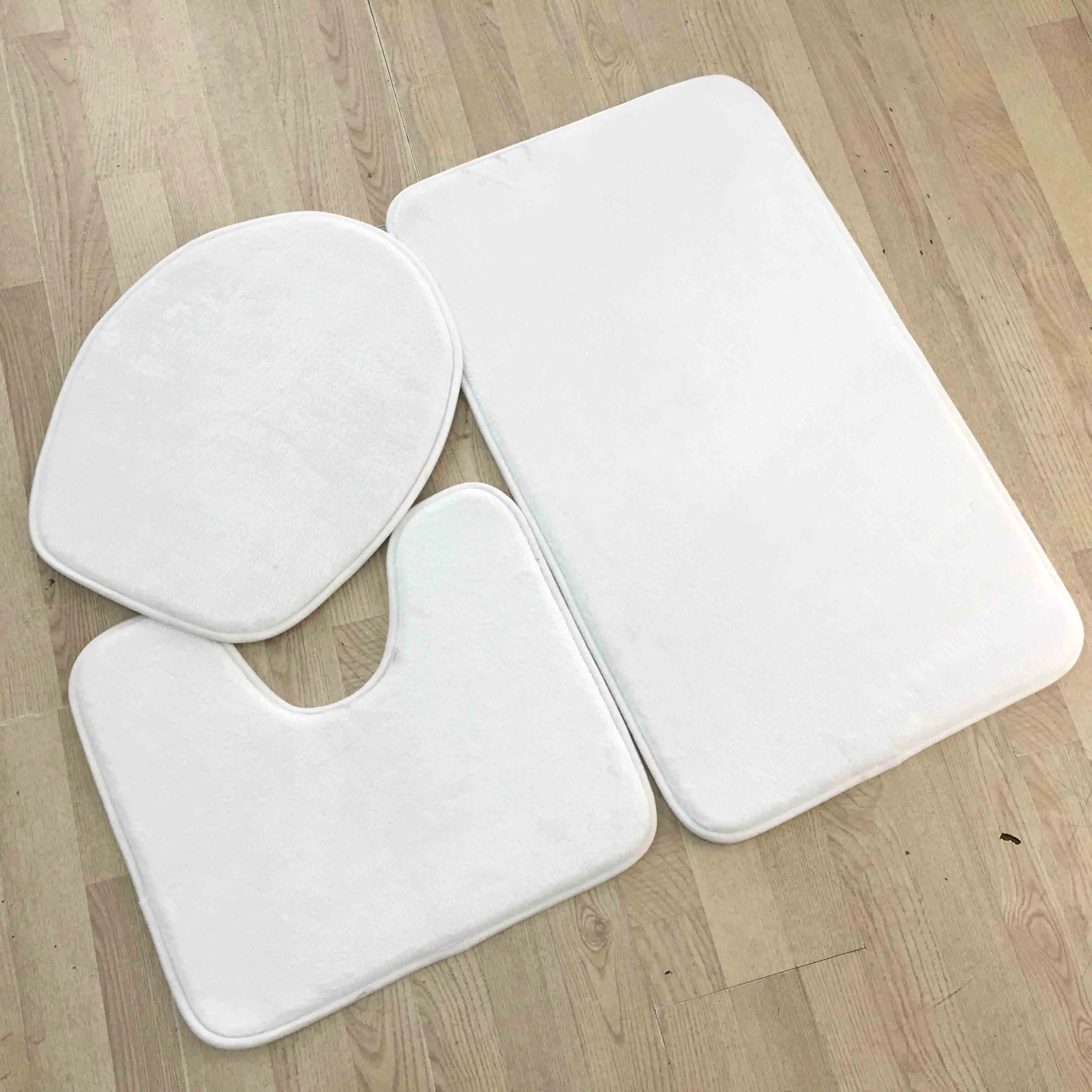 white bathroom mats