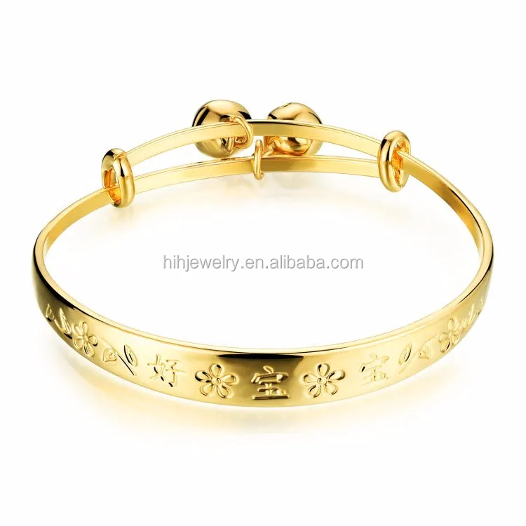 gold band bracelet with circles
