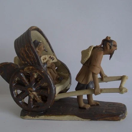 
High Fired Hand Made Clay Figurine 