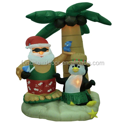 
210cm/7ft inflatable santa claus with a penguin under a palm tree and with internal lights for christmas decoration 
