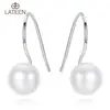 Natural white natural shell pearl earring rhodium filled stud