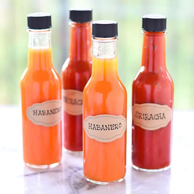 wholesale 100ml round hot chili sauce glass bottle with plastic