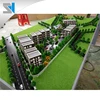 Low rise residential model with miniature trees, Home building model