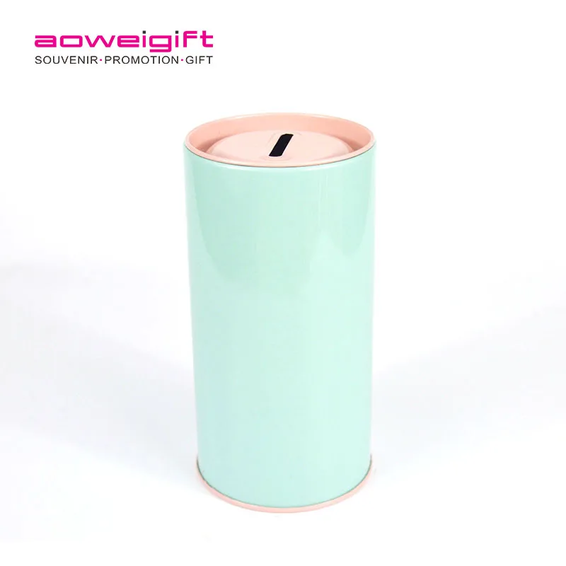 Cylindrical tin piggy bank.jpg