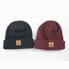 winter beanies with faster shipment 100% acrylic cheap leather badge beanie hat