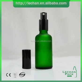 green glass spray bottle