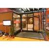 Steel framing ISO container modular house with push-and-pull technique