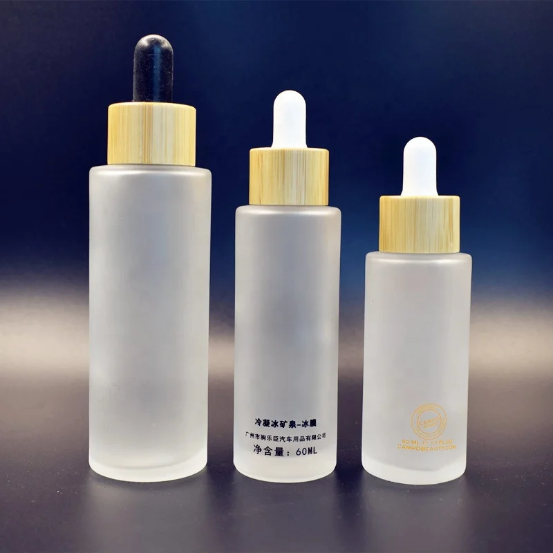 Beautiful Round Frost 2oz Glass Bottle Bamboo Dropper Cap For Skincare
