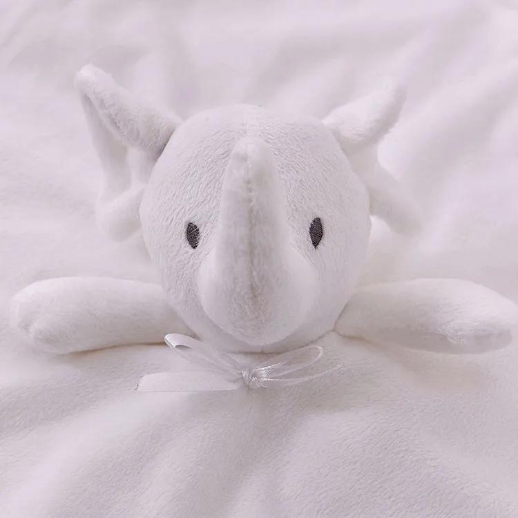 stuffed elephant with blanket