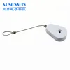 Retractable secure ring display system with cord to attach rings to prevent theft