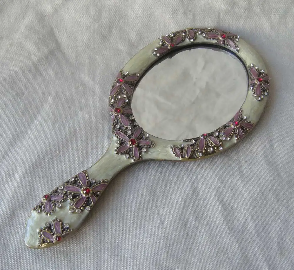 ornate hand mirror