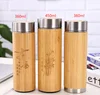 custom logo 600ml double wall bamboo shell leakproof bottle glass cup high borosilicate heat resistant glass water drink bottles