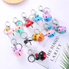 Female bag metal bell spining keyring alloy Women Bag Pendant Keychain pack trinkets personaize keychains with custom logo