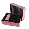 A red and black top and bottom box with lining for expensive jewelry or cosmetics to pack