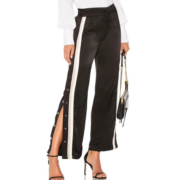 women's black track pants with white stripe